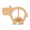 Natural wooden hippo-shaped baby rattle with three sliding rings for sensory play