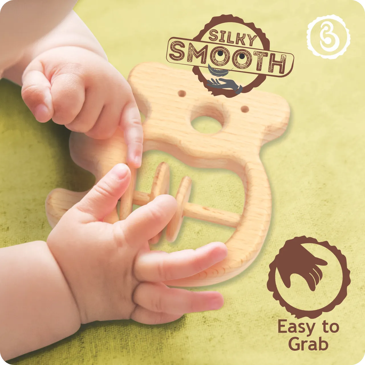 03 (1) Baby's hands grasping the silky smooth wooden koala toy.