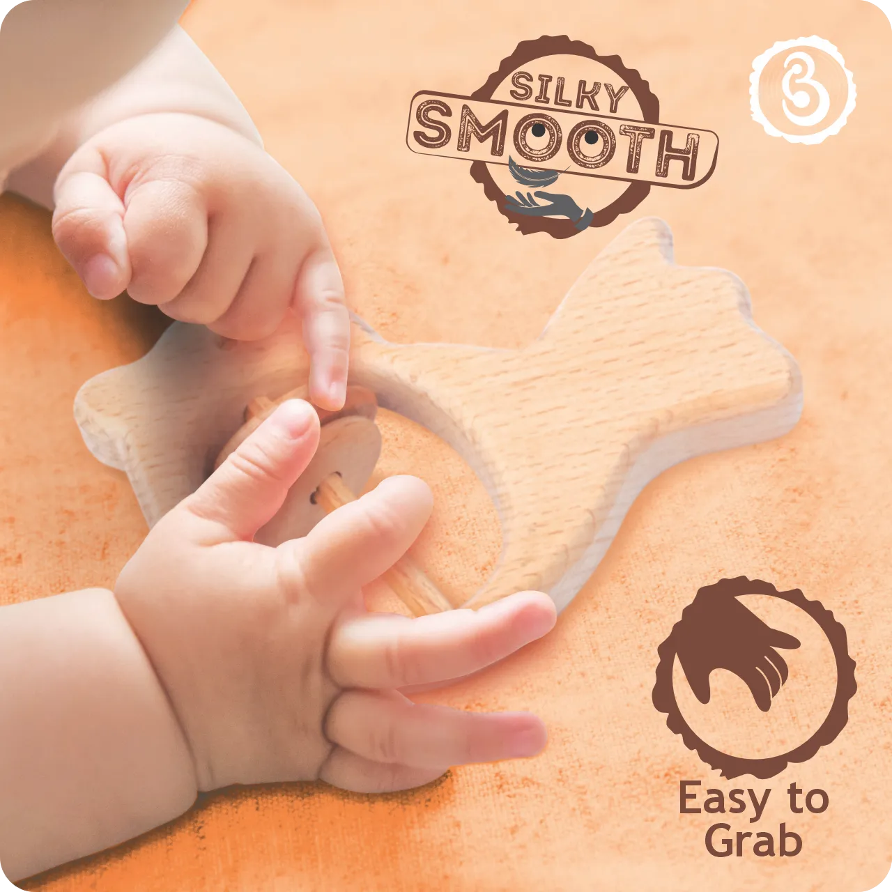 03 Baby hands holding and playing with a smooth wooden bird rattle.