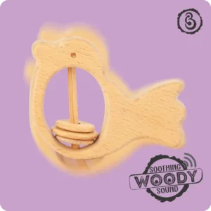 Motion blur of a wooden bird rattle showing its soothing sound.