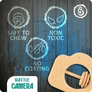 Safety icons for the camera rattle: safe to chew, non-toxic, and no coating.