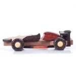 Racercar (1) Side profile of a handcrafted multi-tone wooden Formula 1 race car.