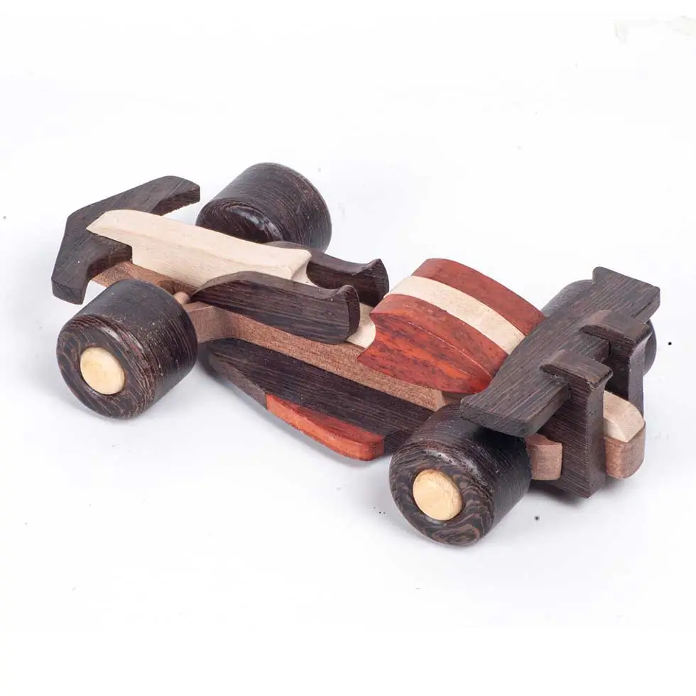 Racercar (7) Overhead diagonal view of a multi-colored wooden race car.