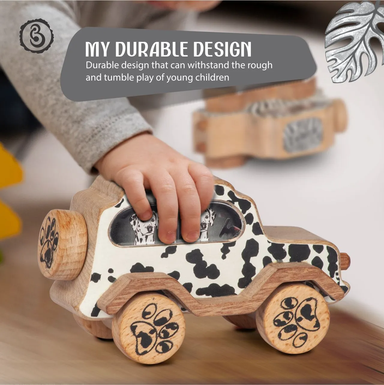 dog 03 A black and white spotted wooden dog car with a grey durability banner.