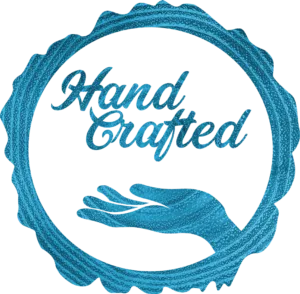 Blue textured "Hand Crafted" seal with an open hand illustration.