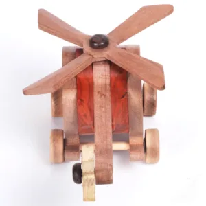 Rear view of a wooden toy helicopter showing the tail rotor and wood grain.