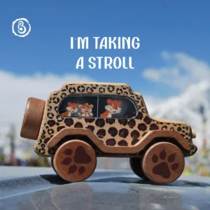 Child's hand on a leopard wooden car with a purple durability banner.