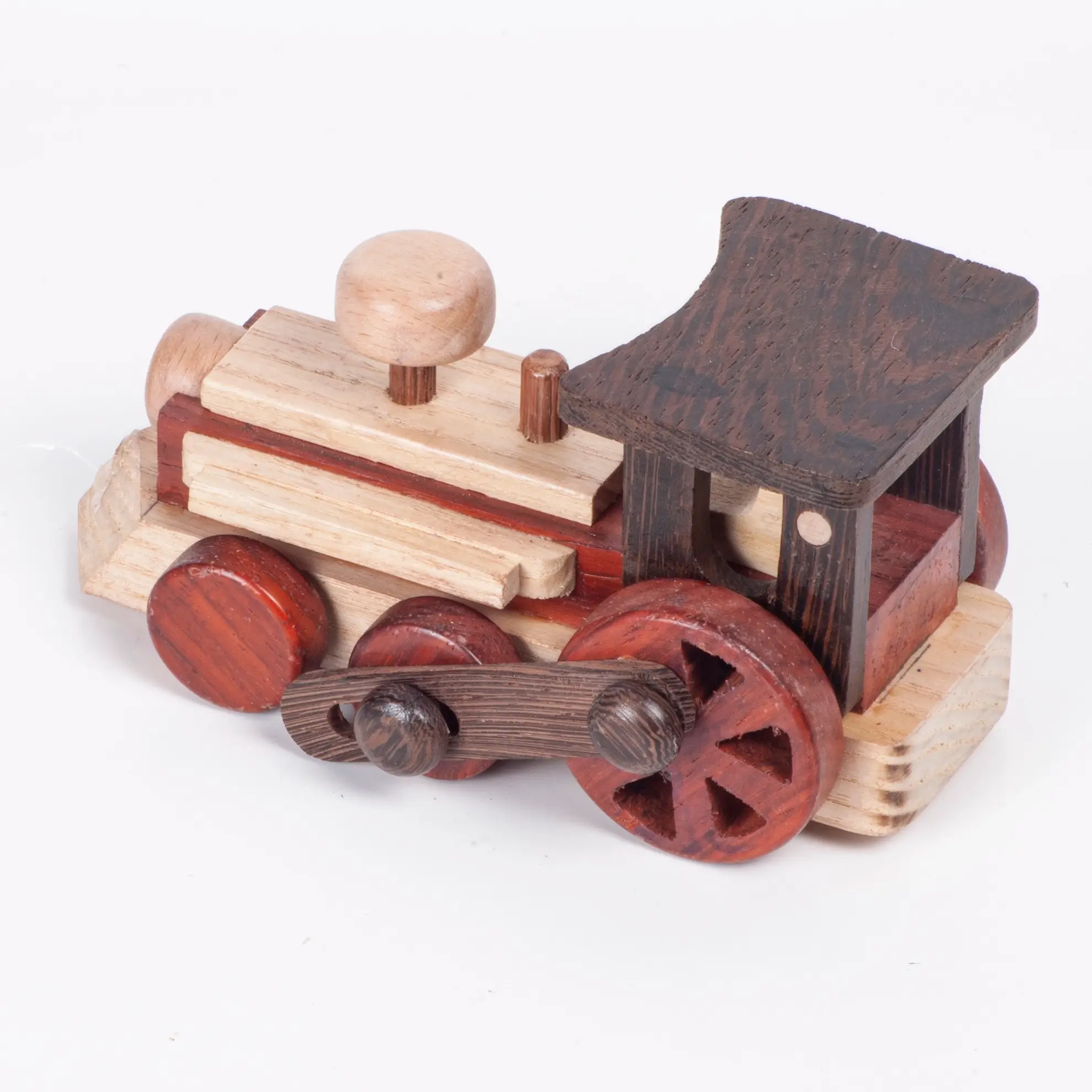 loco_top High-angle diagonal view of a wooden toy train with dark wood accents.
