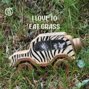 Child's hand on a wooden zebra car with a blue durability banner.