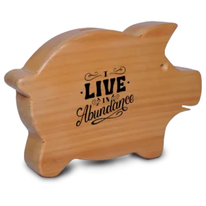 Wooden pig-shaped money bank with coins inside.