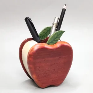 Rear view of the wooden apple organizer holding pens.