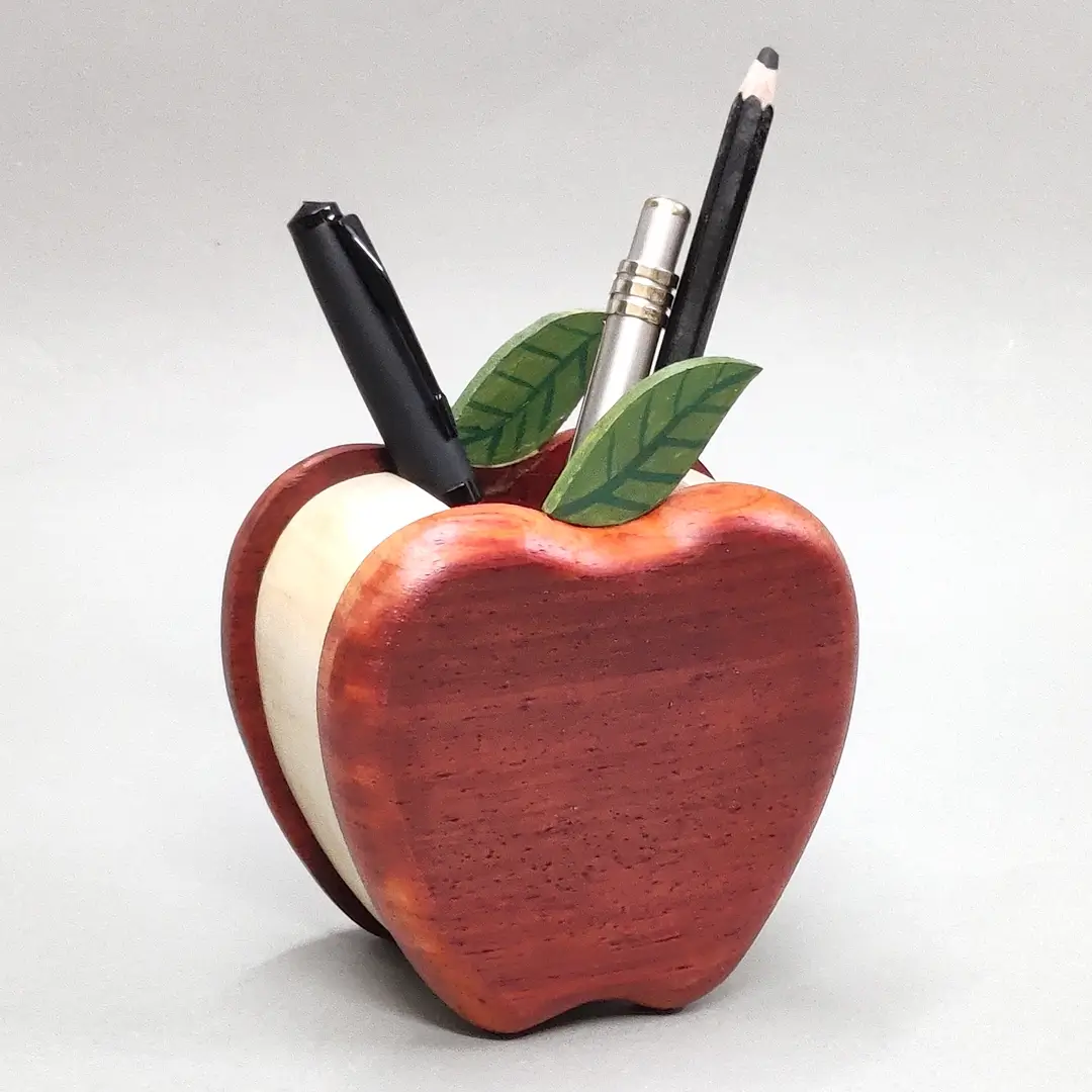 Apple Pen Stand Rear view of the wooden apple organizer holding pens.