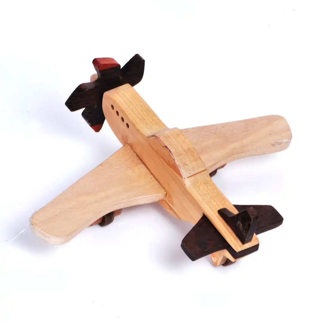 aeroplane05 Bird's-eye view of a wooden toy aeroplane at a diagonal angle.