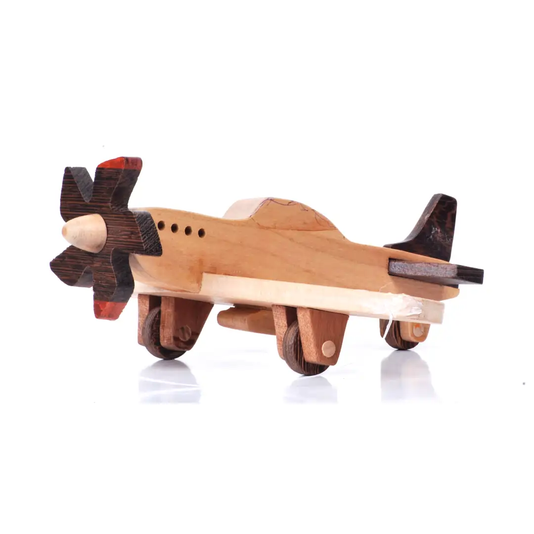 aeroplane06 Low-profile side view of a wooden toy plane with red-tipped propellers.