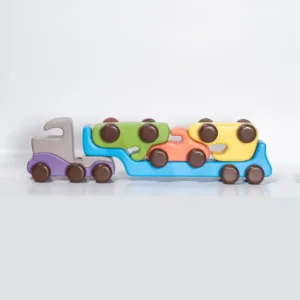 Wooden toy car carrier truck fully loaded with three cars.