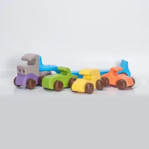 Front angle of a wooden toy truck and three cars.