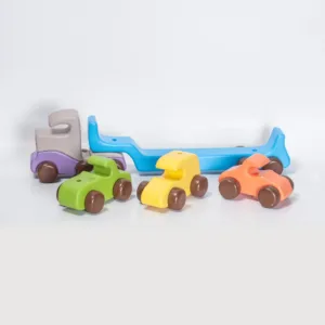Colorful wooden vehicle set with truck and trailer.