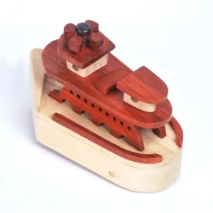 Elevated rear view of a wooden toy ship with porthole cutouts.