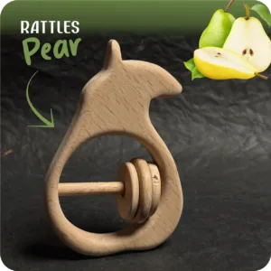 Pear-shaped natural wooden baby rattle with a sliding ring on a textured dark background
