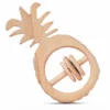 Front view of a natural wood pineapple-shaped baby rattle with detailed crown carving.