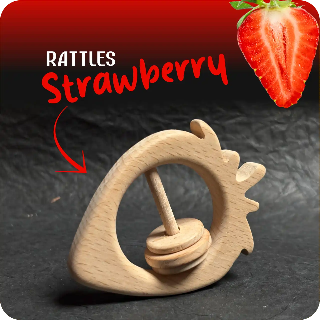 strawberry_name Natural wooden strawberry-shaped baby rattle with sliding rings on a dark textured background.