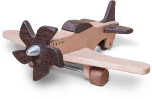 Close-up of a wooden aeroplane with a metallic propeller hub and dark accents.