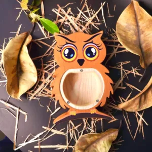 Owl-shaped wooden money box.